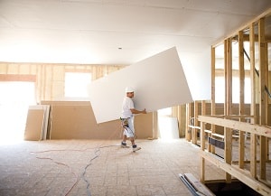 Man hanging ultralight drywall