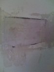 Place more mesh tape on the surface of the Hammock Patch and surrounding drywall.